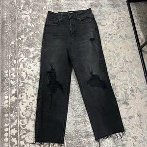 Black ripped jeans. Size 4, worn once!